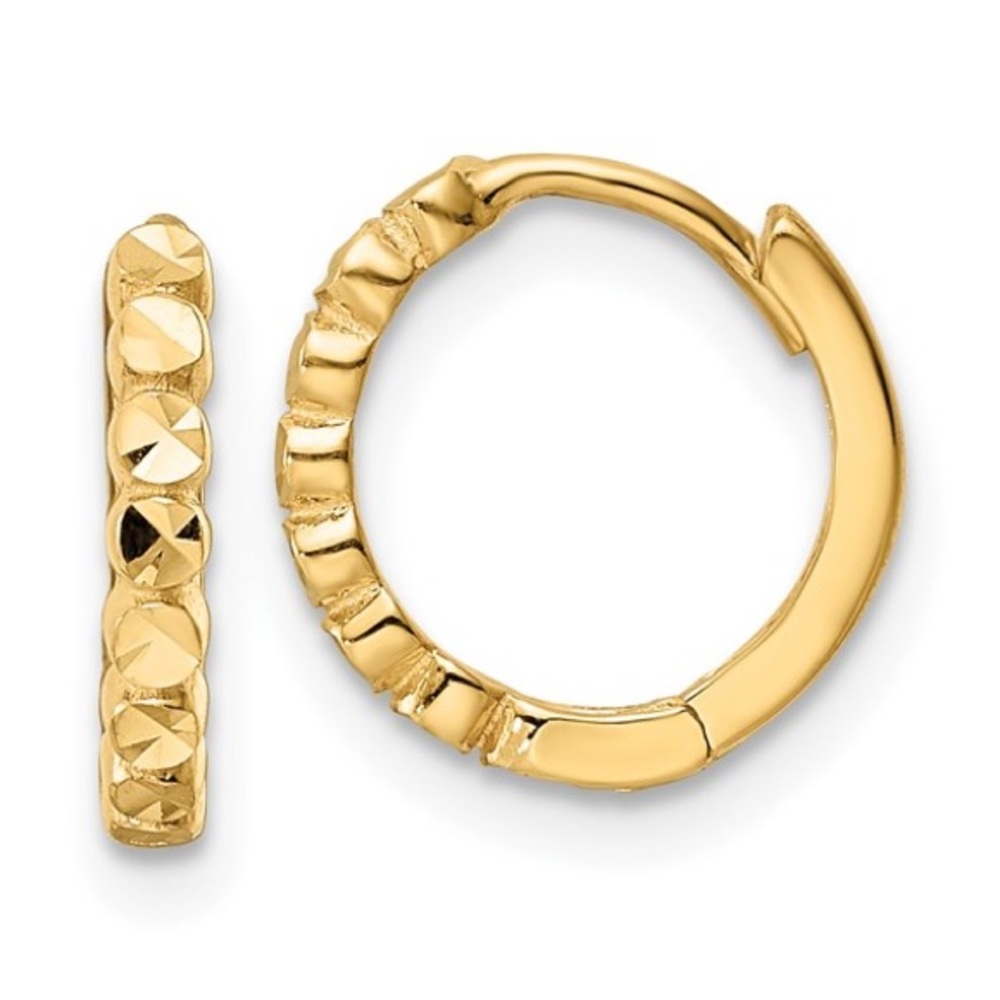 The perfect hoop for stacking! 14 karat yellow gold diamond cut hoop.